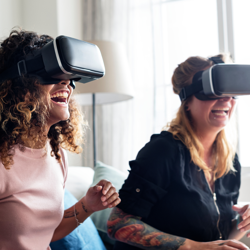 2 ladies using VR headsets